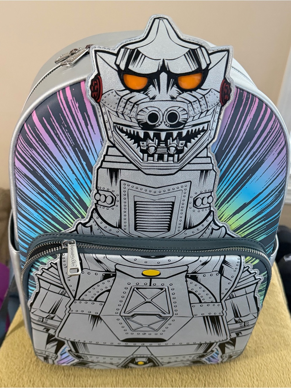 RARE LOUNGEFLY TOHO
GODZILLA MECHAGODZILLA METALLIC
LIGHT-UP
HARD TAG BACKPACK